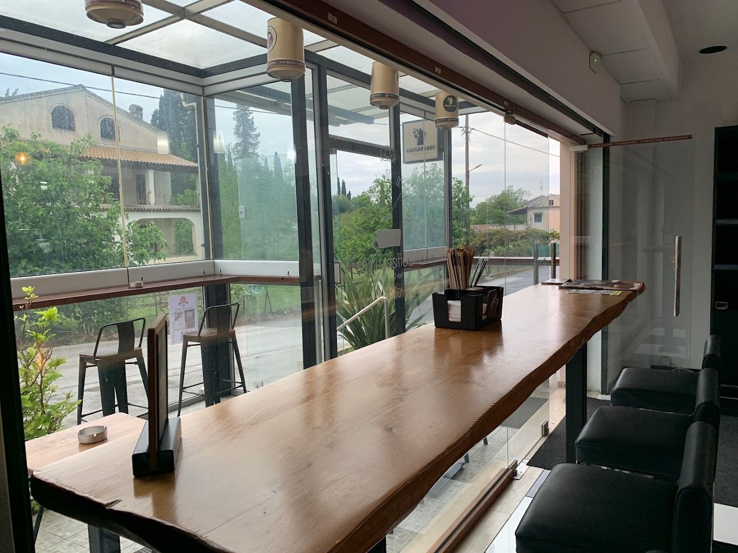Seating area at H.M. Bread & Coffee in Kinopiastes, Corfu