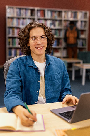 boy-studying-university-library_edited.jpg