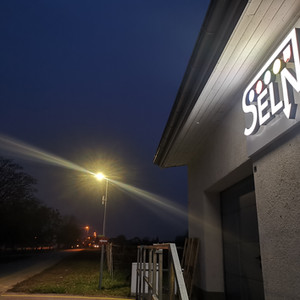 Facade Signage with Inverted Light Effect – Electrical Company
