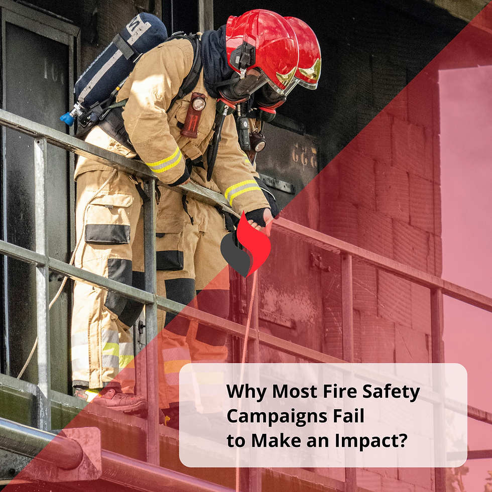 Firefighter in full protective gear and red helmet standing on a metal balcony during training, managing a hose line with smoke in the background, symbolizing workplace fire safety awareness.