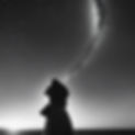 black and white image of person looking up to the stars.jpg