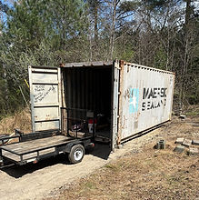 Shipping container at Sweetgum Station with open doors.
