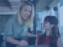 Office worker giving feedback to her colleague