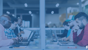 Multi-ethnic group studying, brainstorming, working together or having a business meeting. Startup. Bring your own device area.