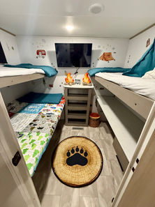 2025 Dutchmen Kodiak 280BHSL RV rental exterior – Bunkhouse camper rental set up at Lake Whitney campground.