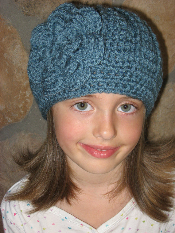 Thumbnail: Quick and Easy Crochet Hat Pattern for baby and girl. Styled with large crochet flower