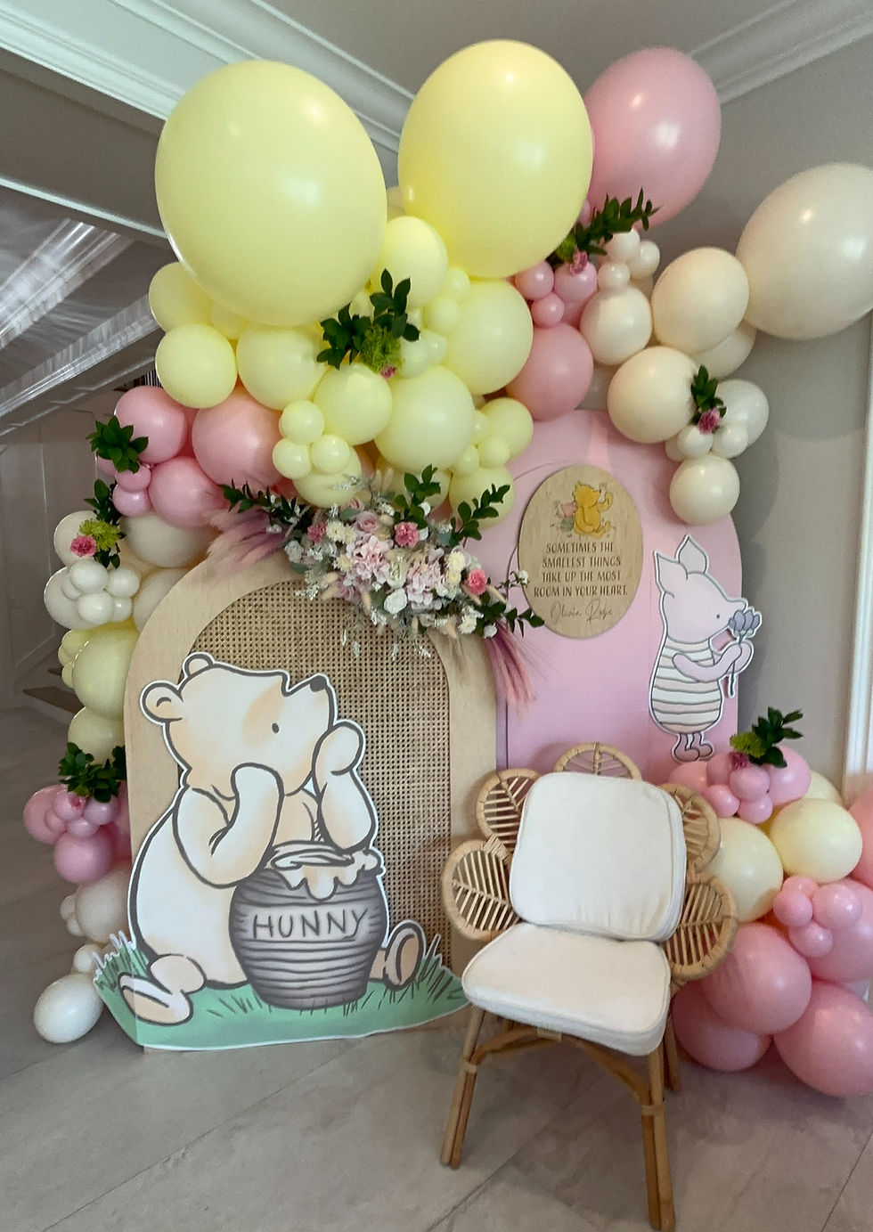 Close-up view of an organic balloon garland with mixed colors and sizes