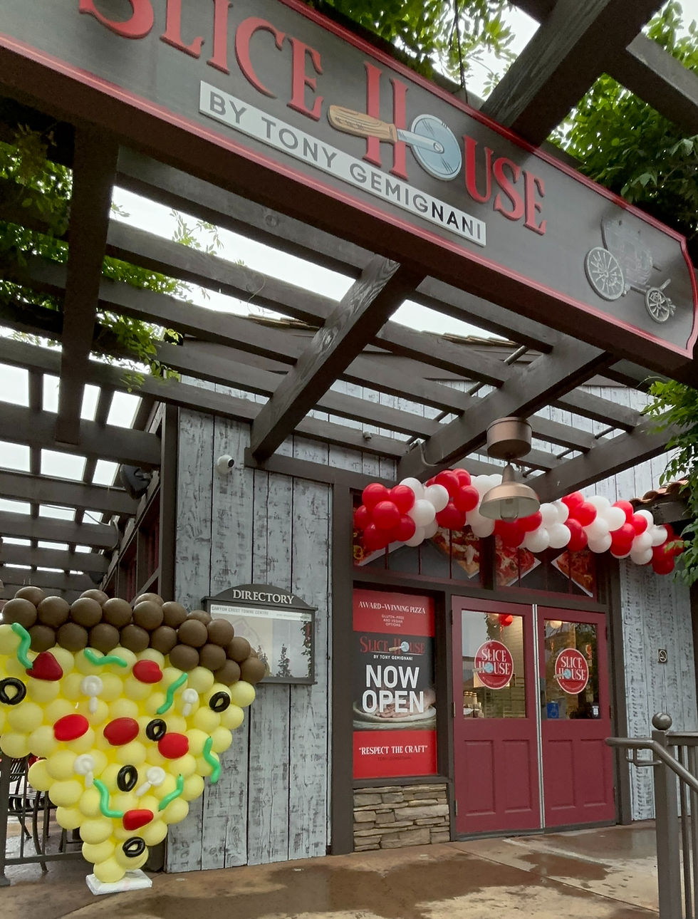 High angle view of a professional balloon artist creating a balloon sculpture