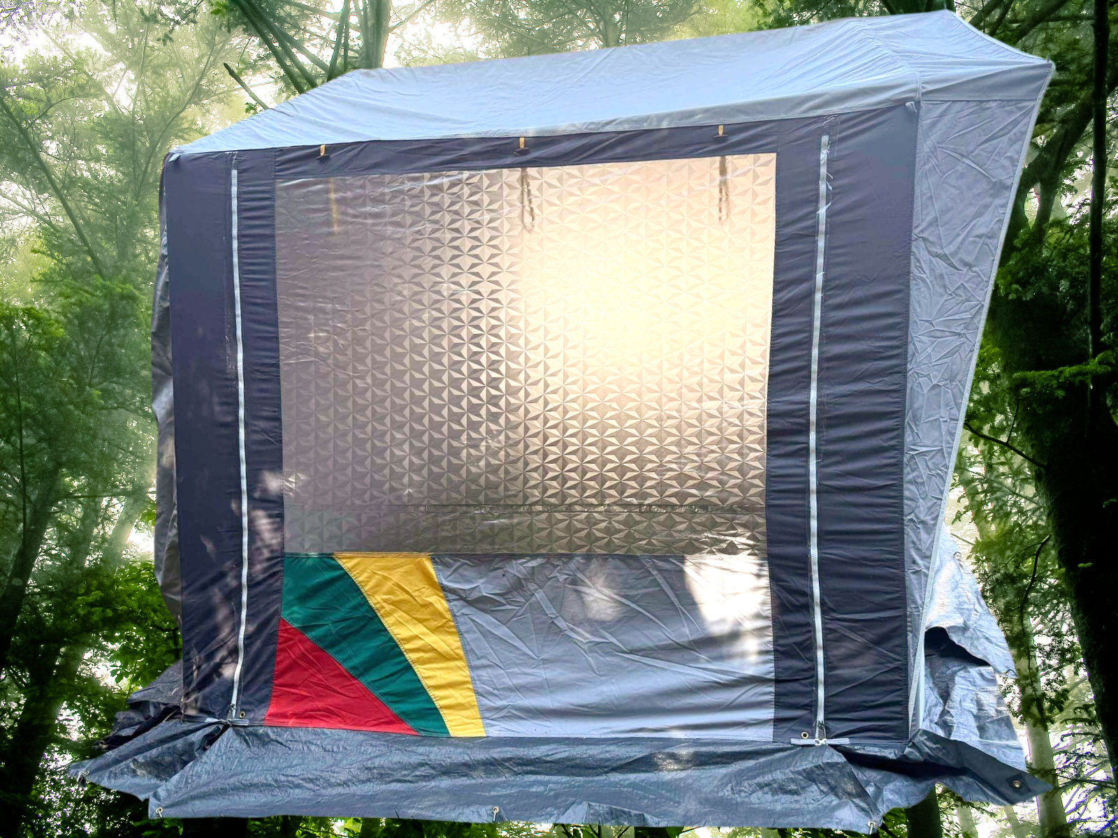 DWT Bregenz II 340cm grey campervan drive-away awning with steel pole frame, large windows and colourful detailing