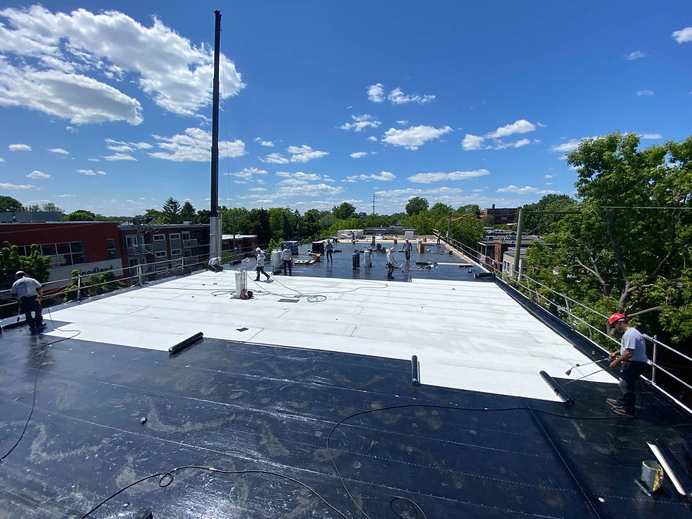 Elastomeric membrane installed on a commercial flat roof in Montreal