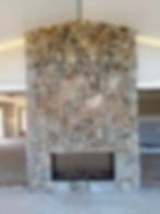 Modern stone fireplaces Armidale with floor to ceiling stonework