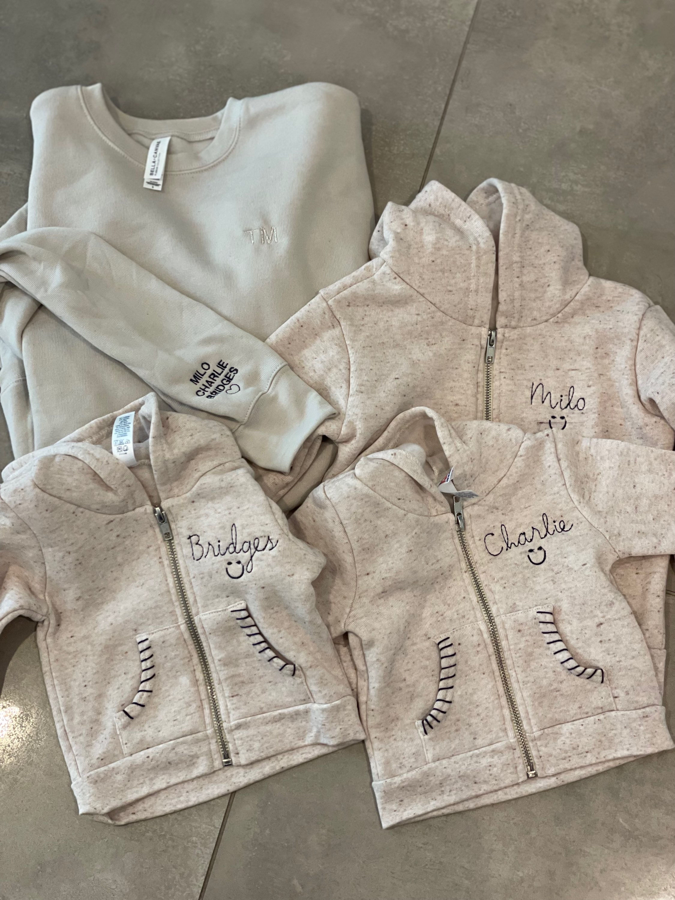 Beige and navy embroidered zip