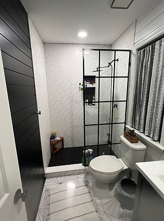 shiplap painted black and white in a modern bathroom