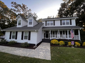 Exterior painting in Charleston, SC a fresh white house and brick painted

