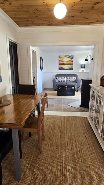 dining room open to both sitting areas