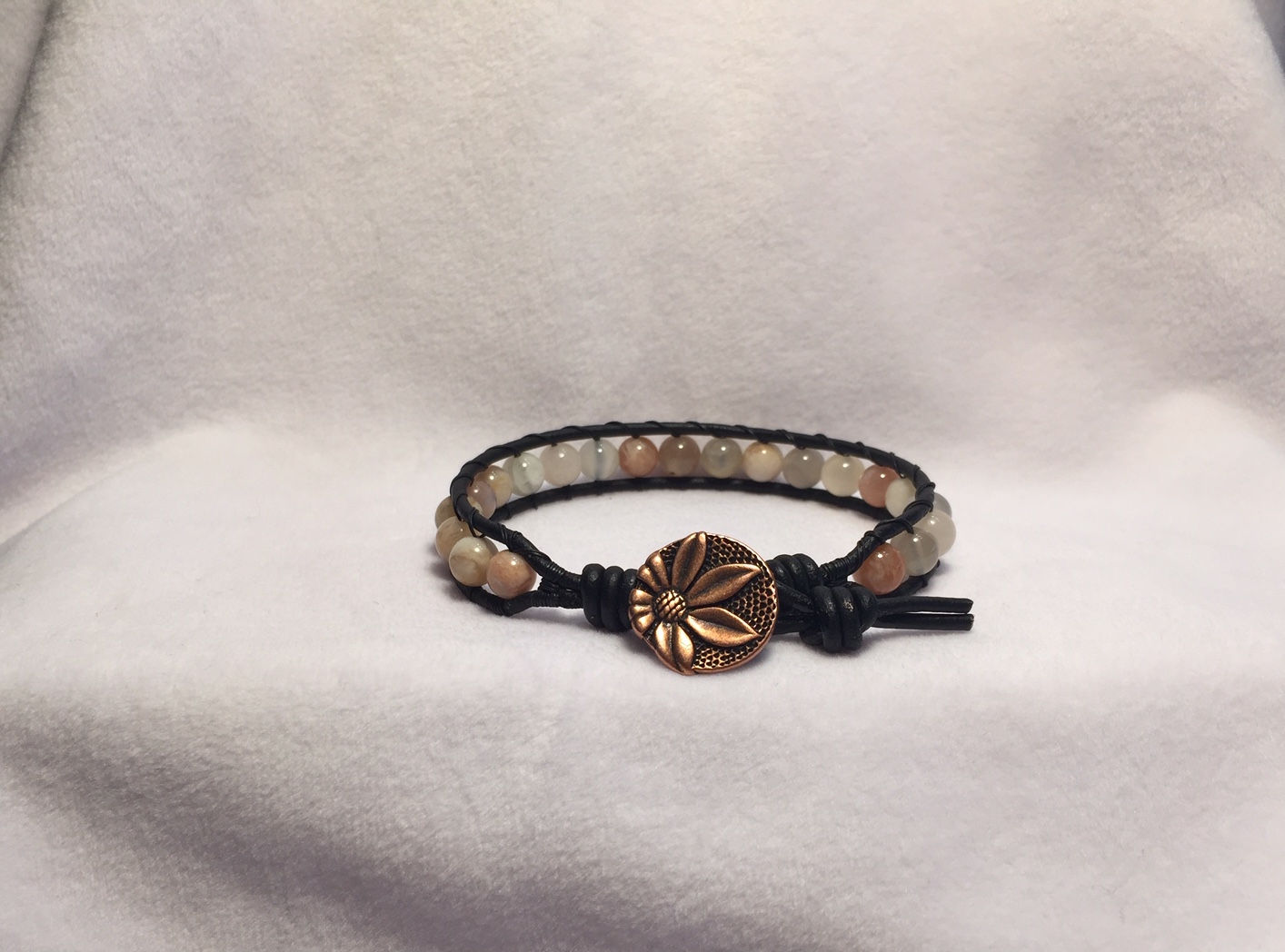 Sunstone beads with (Copper button out of stock)