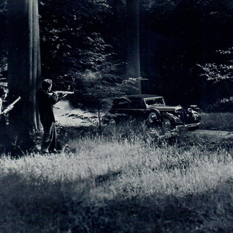 The car carrying Marius Goring is ambushed.