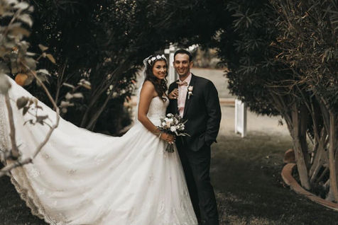 bride and groom posing for gorgeous shoot