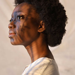 woman headshot/portrait with shadows