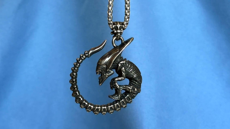 Thumbnail: Video of Alien Skeleton Stainless Steel Necklace with silver-tone skeletal creature pendant and curved tail detail.