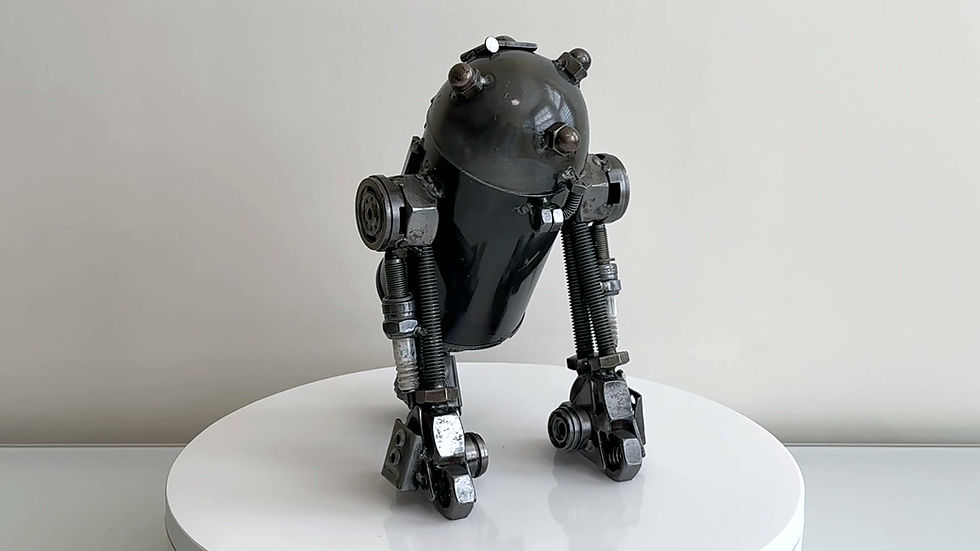 Thumbnail: Video of handmade R2D2 inspired recycled metal robot sculpture showing full 360-degree view