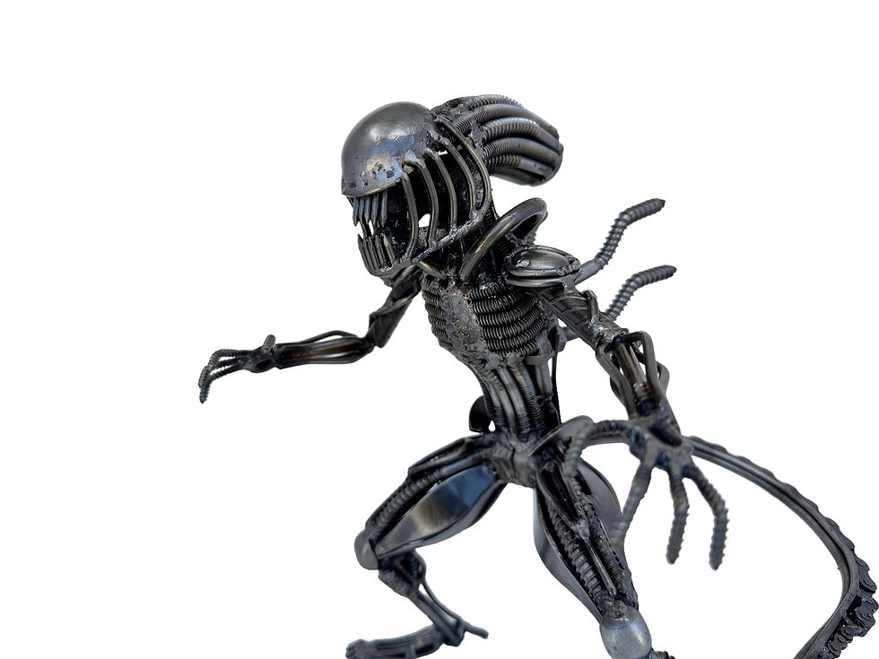 Thumbnail: Handmade scrap steel Alien-inspired statue showing biomechanical body details.