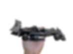 Thumbnail: Recycled metal Formula 1 racing car sculpture shown in hand for size reference