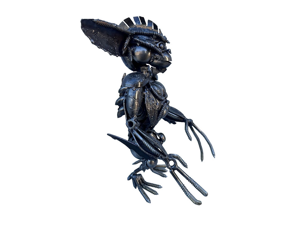 Thumbnail: Handmade Gremlin-inspired recycled metal sculpture standing upright