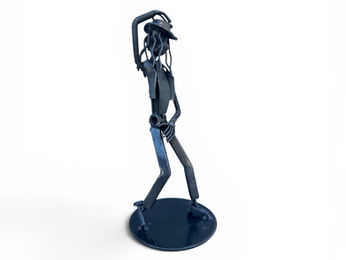 Handmade Michael Jackson inspired recycled metal sculpture featuring a signature dance pose and fedora hat.