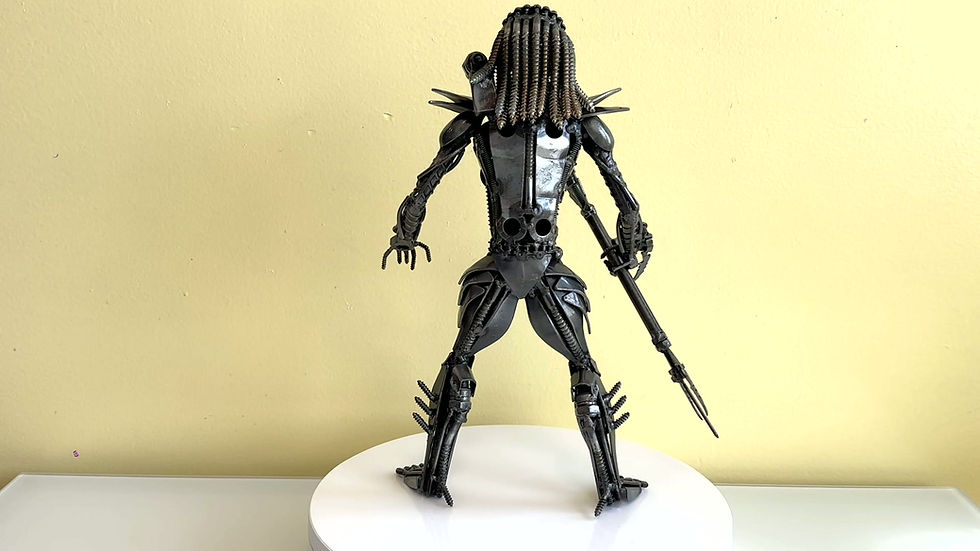 Thumbnail: 360° view of The Galactic Hunter, a Predator-inspired recycled metal sculpture handmade from scrap steel, showing detailed