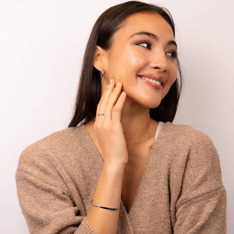 Thumbnail: Twist 3/4 Hoop Earrings with Cubic Zirconia