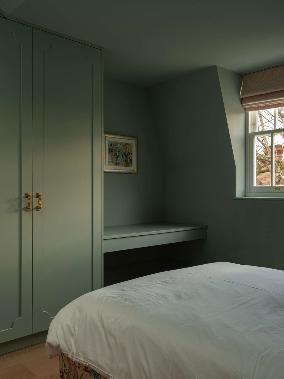 tak-studio-chelsea-loft-bedroom-sage-green-wardrobe-built-in-desk-nook.jpg