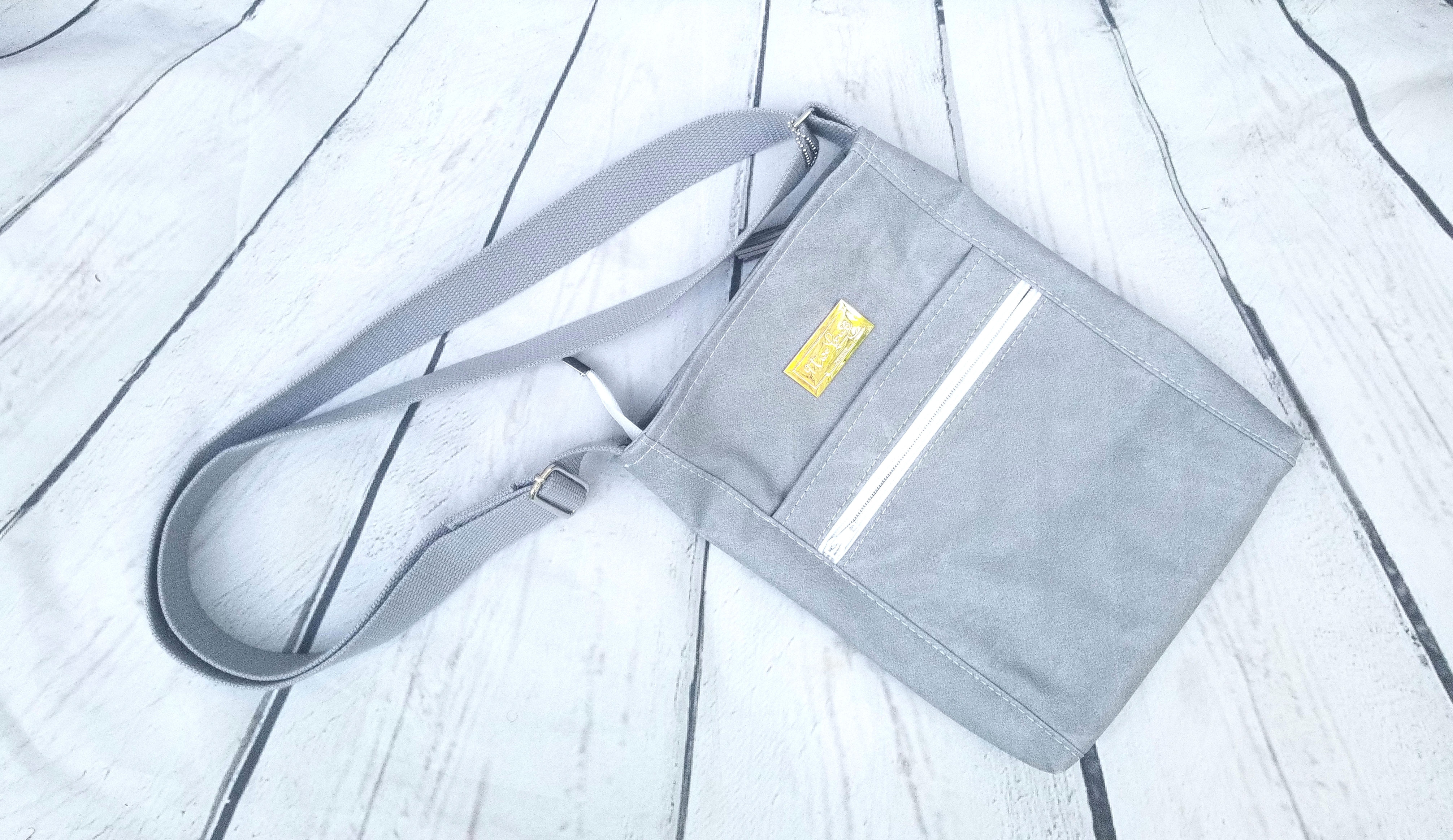 Grey distressed cross body