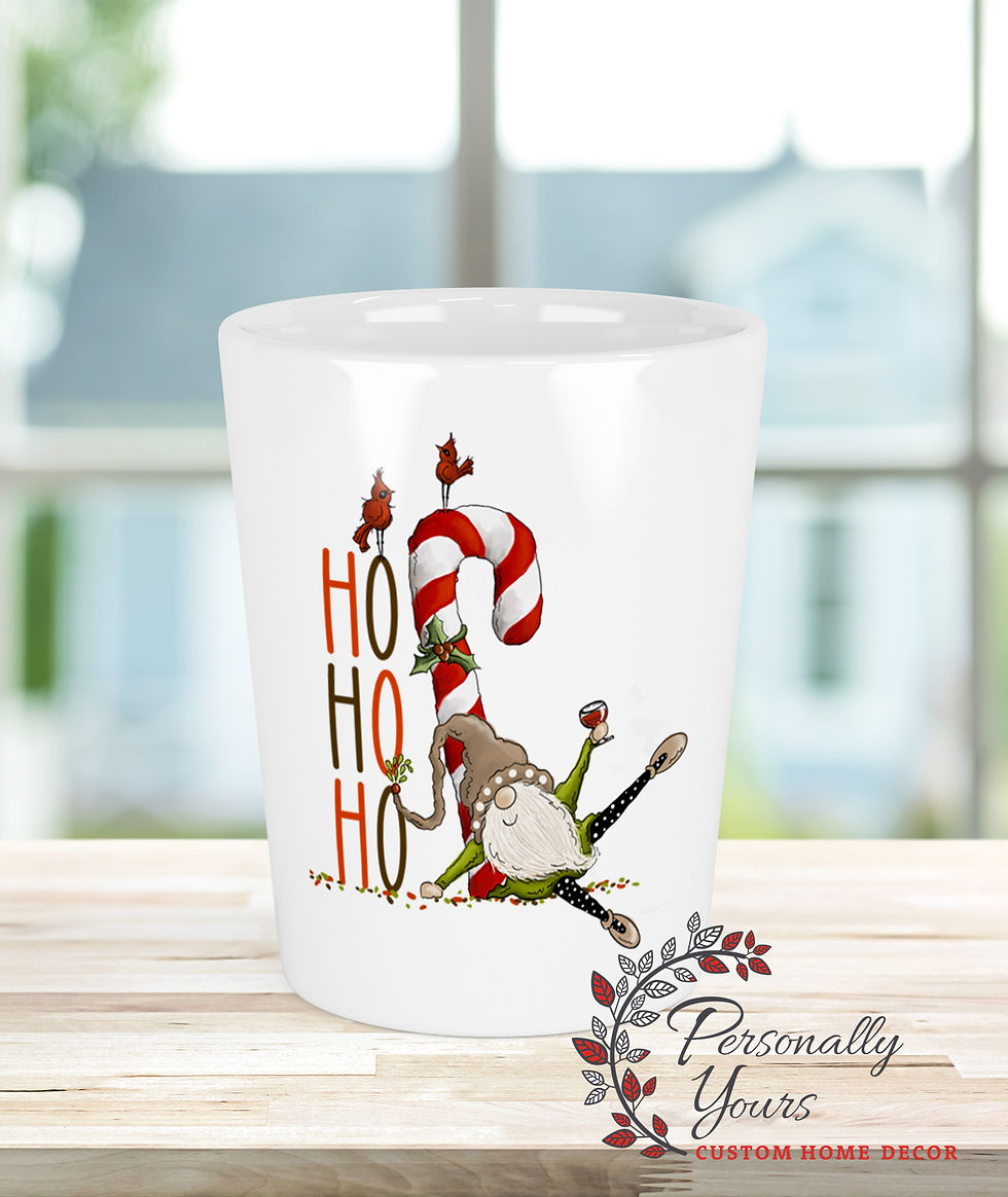 Christmas gnome shot glass with candy cane and “Ho Ho Ho” holiday design