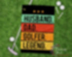 Husband Dad Golfer Legend golf towel in teal multicolor design shown on golf course grass with golf accessories and club