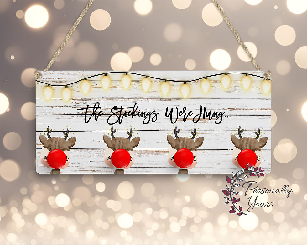 Reindeer Christmas stocking holder with four red ceramic nose knobs and rustic wood design.