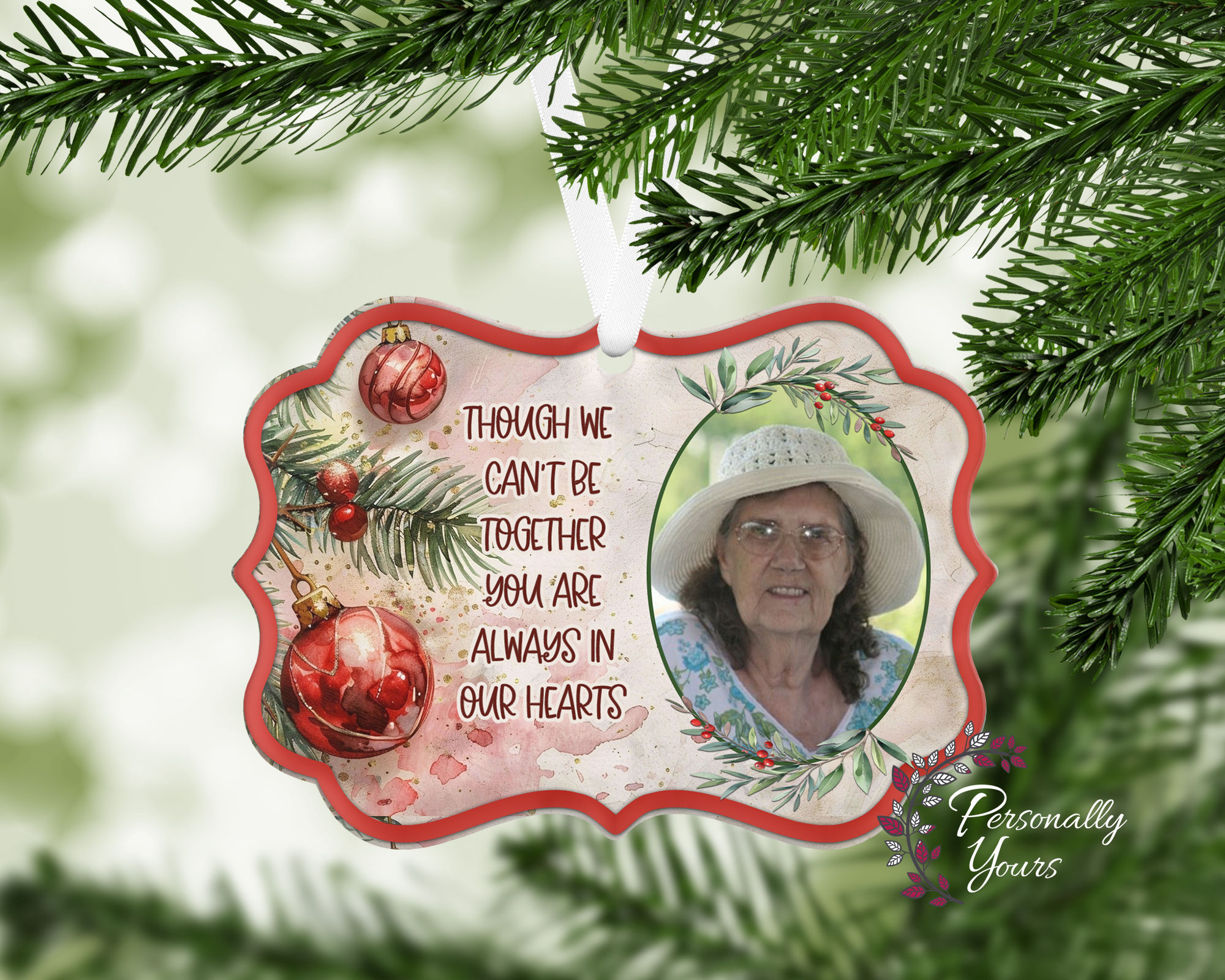 Personalized memorial Christmas ornament with loved one's photo, festive greenery, and remembrance message.