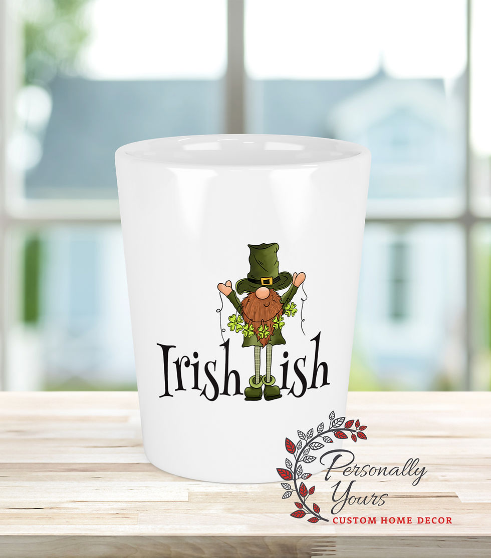 Thumbnail: White ceramic shot glass featuring an Irish gnome holding shamrocks with the phrase “Irish-ish” for St. Patrick’s Day