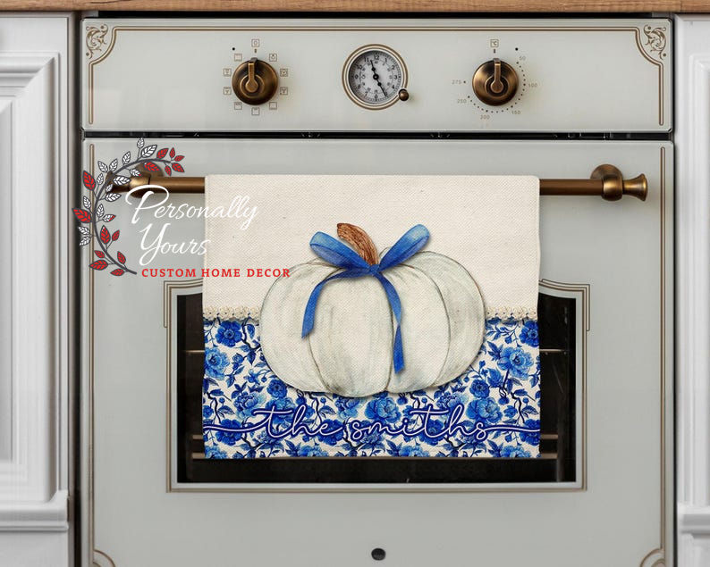 Rustic blue floral pumpkin fingertip towel with personalized name, velour front, and cotton terry back.