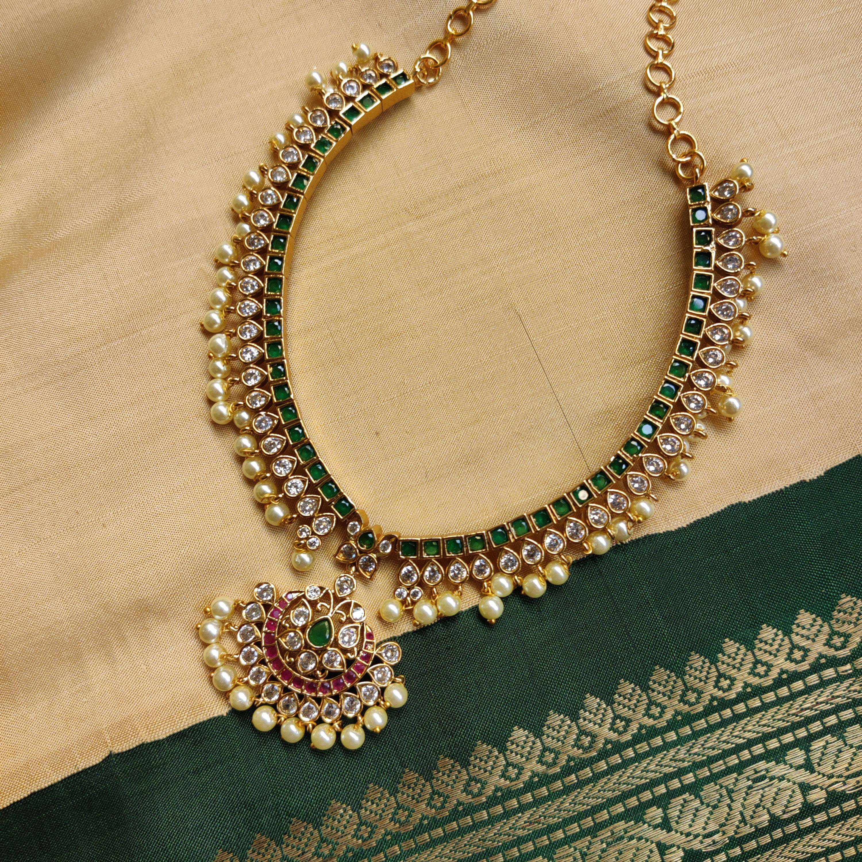 Padmavathi Adigai with green, maroon, white AD stones and pearls