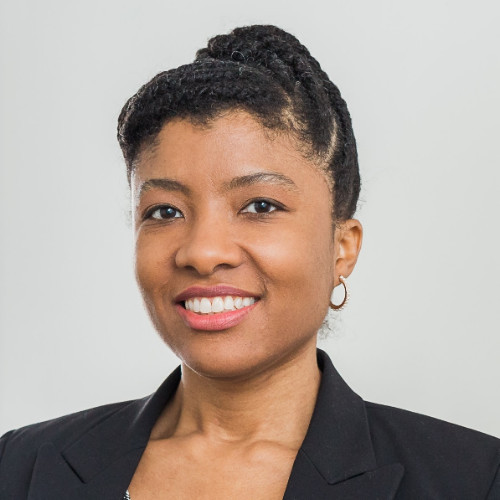 A professional headshot of Candice Kelly.