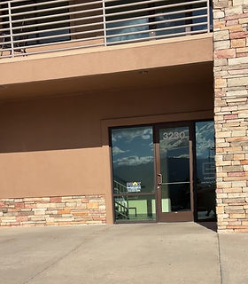 Building entrance marked 3230 facing Pikes Peak, Luxe Cosmetic Studios, Colorado Springs