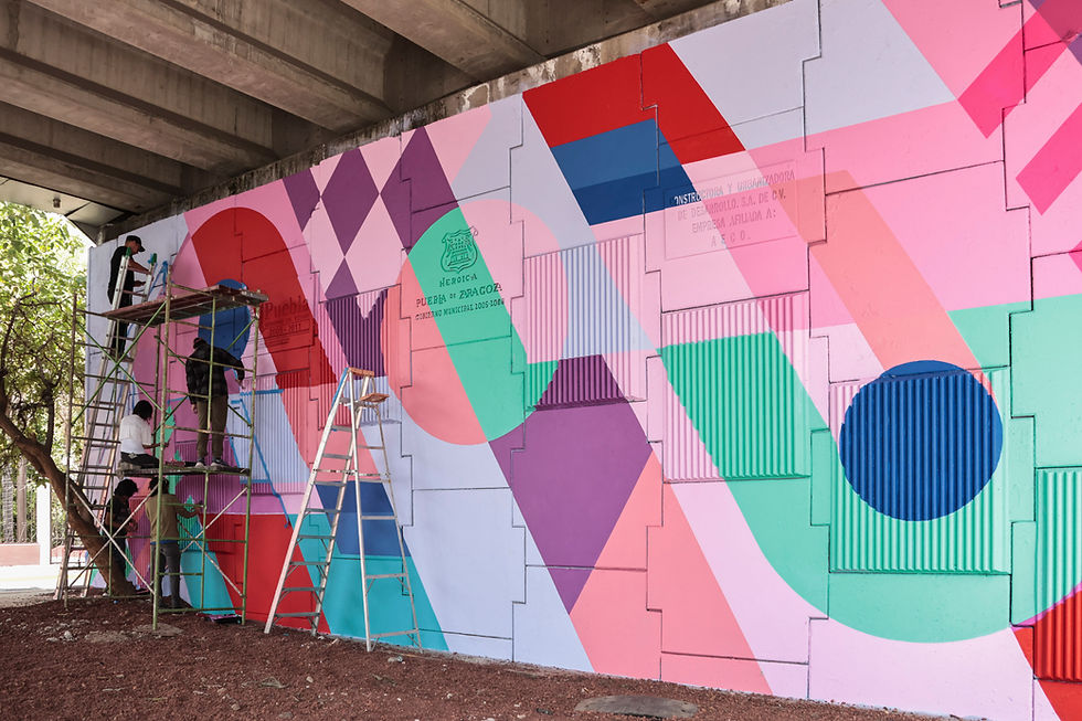 Teddy Kelly transforma puente frente a Ciudad Universitaria de la BUAP con arte urbano
