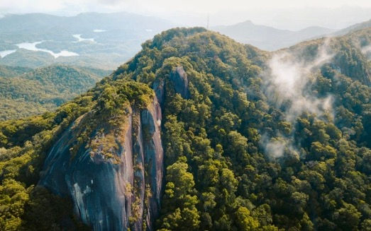 Top Hiking Trails Around Cairns: Explore the Best Views in Tropical North Queensland
Cairns isn’t just about the Great Barrier Reef—the surrounding landscapes are packed with stunning hiking trails for outdoor enthusiasts. Whether you’re craving panoramic views, rainforest adventures, or the challenge of Queensland’s tallest peak, there’s a trail for you. Here are five must-visit hiking spots around Cairns to add to your itinerary.
1. Mt Bartle Frere – Queensland’s Highest Mountain
If you're looking for a real challenge, Mt Bartle Frere in Queensland is the place to go. Standing at 1,611 meters, it's the highest peak in the area and offers a tough but rewarding hike.
The trail takes you through the beautiful rainforests of Wooroonooran National Park, showcasing a diverse ecosystem that nature lovers will appreciate. The 15-kilometer return hike is hard and best for experienced trekkers.
You'll enjoy stunning rainforest scenery, encounter unique wildlife, and after a tough climb, be rewarded with amazing views from the summit, stretching from the coast to the Atherton Tablelands.
To fully enjoy the hike, it's best to start early. Whether you're looking for a challenge or a chance to connect with nature, Mt Bartle Frere will give you a memorable experience.
2. White Rock Peak – Southern Cairns Views
Nestled away from the usual tourist spots, White Rock Peak is truly a hidden gem that offers breathtaking views over the southern end of Cairns. This hike is a wonderful escape into nature, guiding you through lush bushland that eventually unveils a dramatic lookout.
What makes White Rock Peak especially appealing is that it’s a shorter hike compared to other trails in the area, making it a fantastic choice for those who want a rewarding experience without committing to a lengthy trek. The 6 km return trail strikes a perfect balance between accessibility and adventure, inviting both seasoned hikers and casual walkers alike to enjoy its beauty.
As you navigate the trail, you’ll find it relatively quiet, allowing you to soak in the stunning southern views in a serene atmosphere. The peacefulness of the surroundings enhances the experience, making it a perfect spot for a little reflection or simply to appreciate the natural beauty around you.
When planning your visit, remember to pack some water and sunscreen. Certain sections of the trail are exposed to the sun, so it's wise to stay hydrated and protect your skin. Embrace the adventure and enjoy all that White Rock Peak has to offer!
3. Lambs Head (Kahlpahlim Rock) – Views Over Lake Morris
If you're in search of breathtaking views, Lambs Head, also known as Kahlpahlim Rock, is a must-visit destination.
Nestled within the lush expanse of Dinden National Park, this trail takes you on a captivating journey through dense rainforests, leading you to a stunning summit that offers sweeping vistas over Lake Morris and the surrounding mountain ranges.
The hike is approximately 12 kilometers round trip and presents a moderate to hard challenge, making it perfect for adventurous spirits. As you ascend, you'll be treated to remarkable scenery that showcases the beauty of the remote rainforest, providing a serene escape from the hustle and bustle of city life.
One essential tip for this trek: be sure to wear sturdy footwear, as sections of the trail can be steep and rocky. So lace up your boots, equip yourself with plenty of water, and get ready to experience the scenic wonder that Lambs Head has to offer!
4. Glacier Rock / The Douglas Track – City and Ocean Views
One of the most accessible and rewarding hikes near Cairns is the Glacier Rock trail via The Douglas Track.
This scenic trail beautifully blends history and nature, following the same route once traversed by railway workers. As you make your way to the lookout point, you'll be treated to breathtaking views of Cairns city and the Coral Sea.
The trail stretches approximately 8 kilometers for a return journey and is considered moderate in difficulty. Along the way, you'll enjoy a refreshing rainforest walk, discover remnants of the historical railway, and take in stunning city and ocean vistas.
For the best experience, consider embarking on this hike at sunrise or sunset when the lighting casts a magical glow over the coastline. Whether you're an avid hiker or just looking for a beautiful spot to enjoy nature, Glacier Rock via The Douglas Track is a must-visit.
4. Walshs Pyramid – Conquer the Iconic Peak
Walshs Pyramid stands at 922 meters and is located just south of Cairns. It is the tallest freestanding pyramid in the world. This peak offers a challenging climb and stunning views that reward your effort.
The trek to the top is about 6 kilometres round trip and is hard, featuring a steep ascent. However, the views from the summit are worth it. You will see 360-degree panoramas of the beautiful landscape around you.
If you plan to climb Walshs Pyramid, it's best to go during the dry season from May to October. This time offers safer conditions and a more enjoyable experience. Climbing Walshs Pyramid is not just about reaching the top; it’s also about appreciating the journey and the amazing sights along the way.
Explore Cairns with Simba Car Hire
With so many incredible hiking trails to discover, having the freedom to explore at your own pace is essential. At Simba Car Hire, we make it easy to access these natural wonders with reliable vehicles suited for all your adventures. Whether you’re tackling Mt Bartle Frere or chasing the views from Walshs Pyramid, we’ve got you covered.
Book your Cairns adventure today with Simba Car Hire and start exploring!
