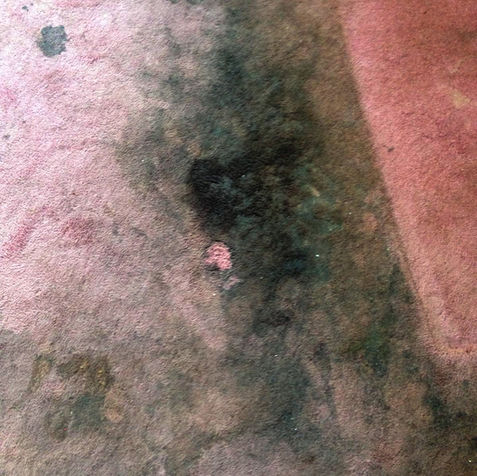 Textured surface with dark green and reddish discoloration, pinkish spot. Completely dirty carpet. 