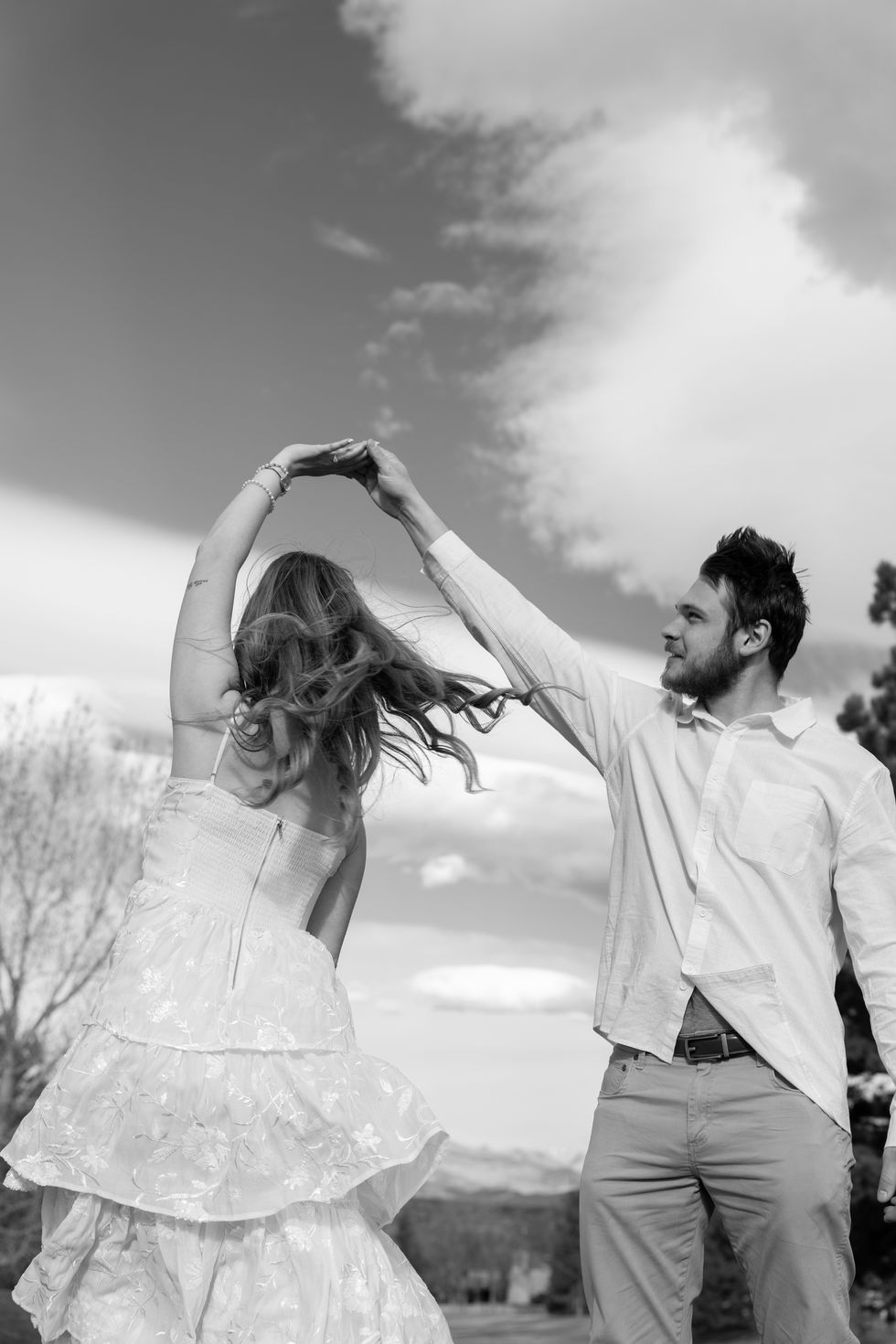Romantic engagement session capturing couple’s love in natural setting