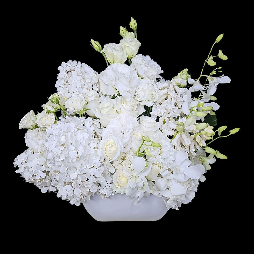 Thumbnail: Elegant selection of premium white flowers arranged in a large ceramic boat shaped vase