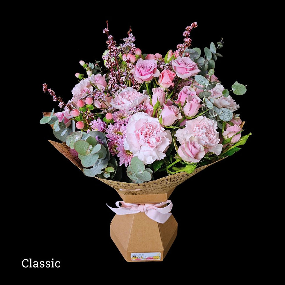 Thumbnail: Classic Pink Flower bouquet in an eco carton vase very pink