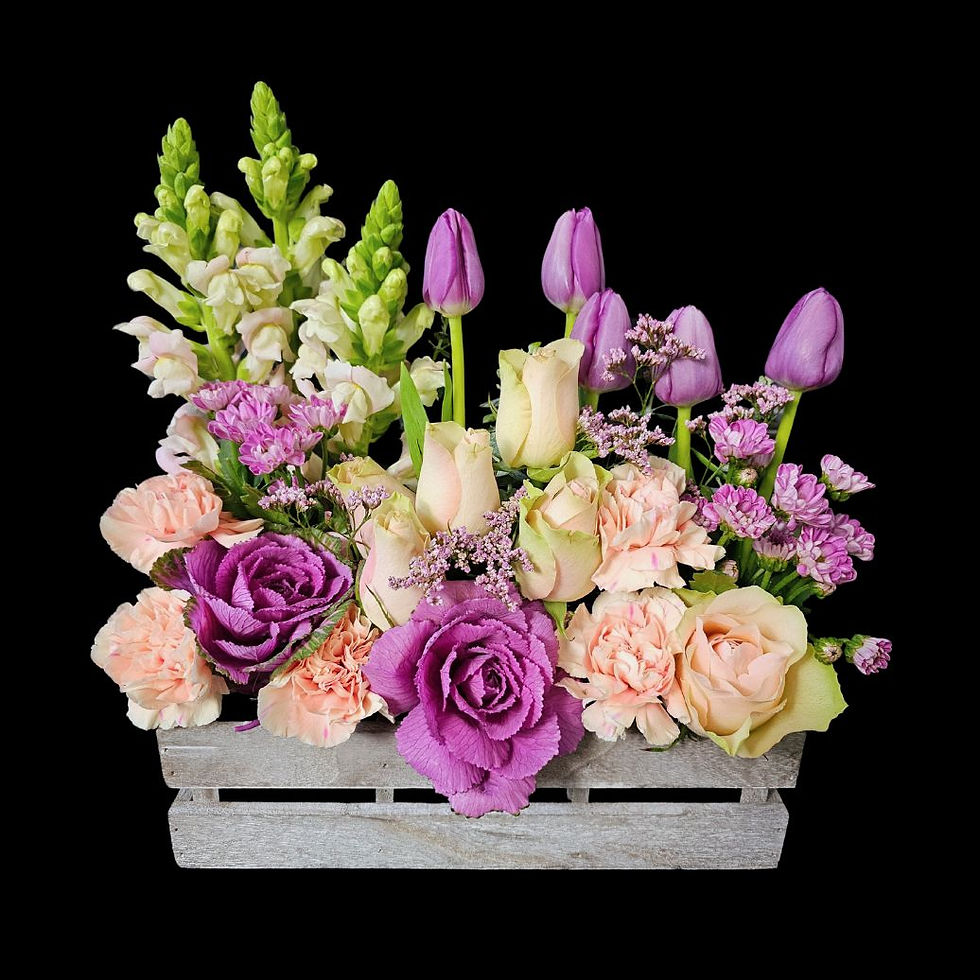 Thumbnail: Selection of pastel purple flowers arranged in a flower window box
