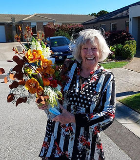 client-holding-a-flower-bouquet-from-flowers-by-zak.jpg